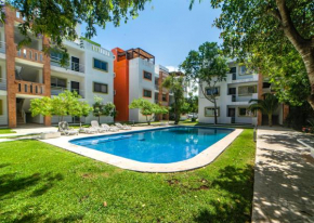 Beel-Ha Apartments-Cozy 3 bedrooms condo close to the airport with wifi, pool, bbq space, game area and free parking
